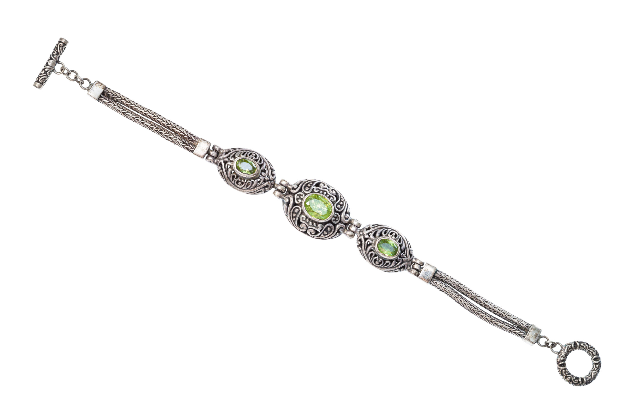 silver bracelet with natural peridot gemstones