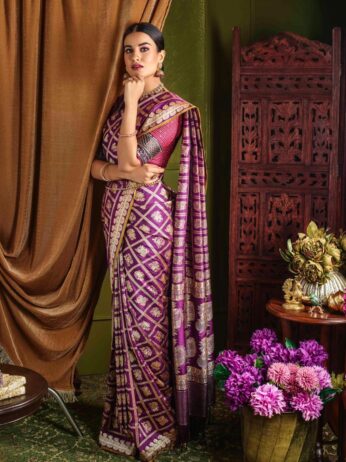 Model donning Maroon Banarsi Silk Saree by Kankatala