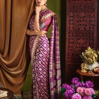 Model donning Maroon Banarsi Silk Saree by Kankatala
