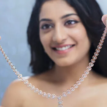 women wearing diamond necklace