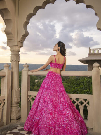 bright pink sequined lehenga from Neeta Lulla’s 2023 Festive Collection.| Rani Pink sequined lehenga Neeta Lulla festive collection 2023 Designer pink lehenga Indian bridal couture Festive fashion trends 2023 Luxury lehenga design