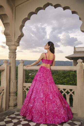 bright pink sequined lehenga from Neeta Lulla’s 2023 Festive Collection.| Rani Pink sequined lehenga Neeta Lulla festive collection 2023 Designer pink lehenga Indian bridal couture Festive fashion trends 2023 Luxury lehenga design