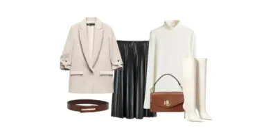 Neutral-toned pleated skirt styled with a beige blazer, turtleneck sweater, white knee-high boots, and a brown belt and handbag.